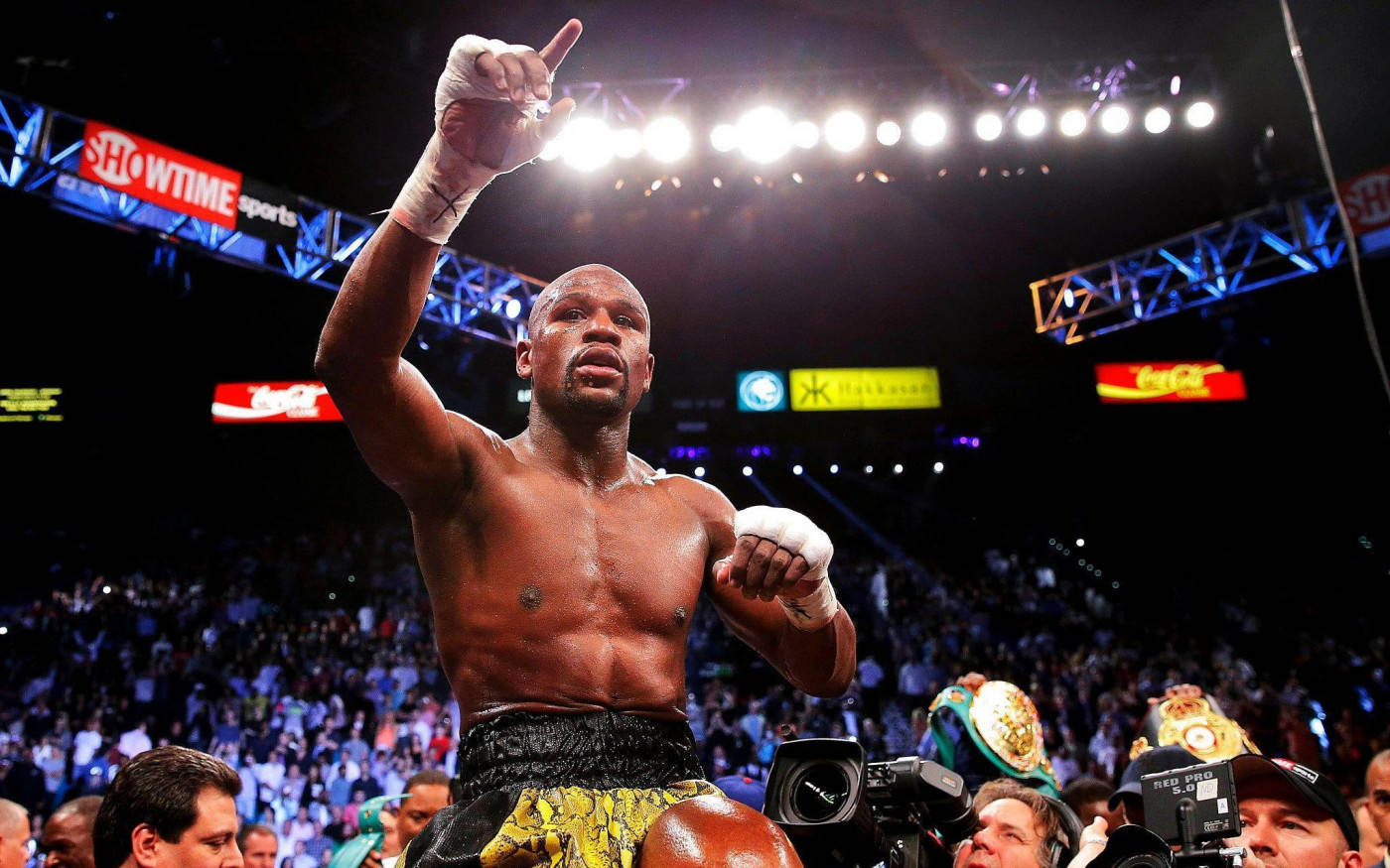 Floyd Mayweather Raising Finger Light Shining Wallpaper