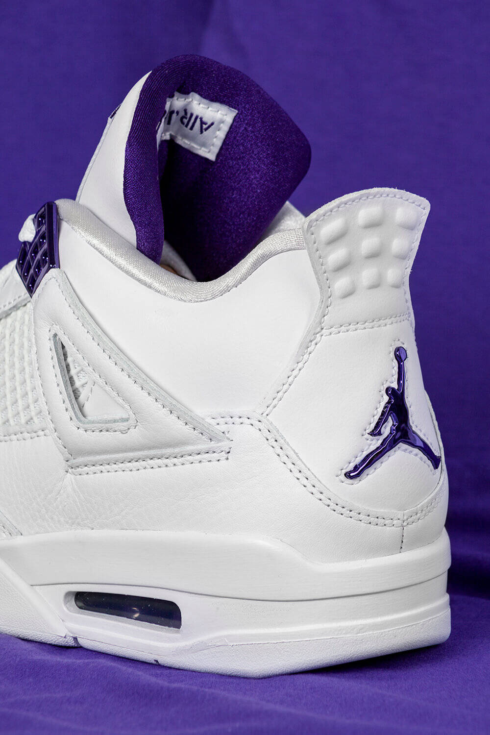 Fly To New Heights With Purple Jordan Wallpaper