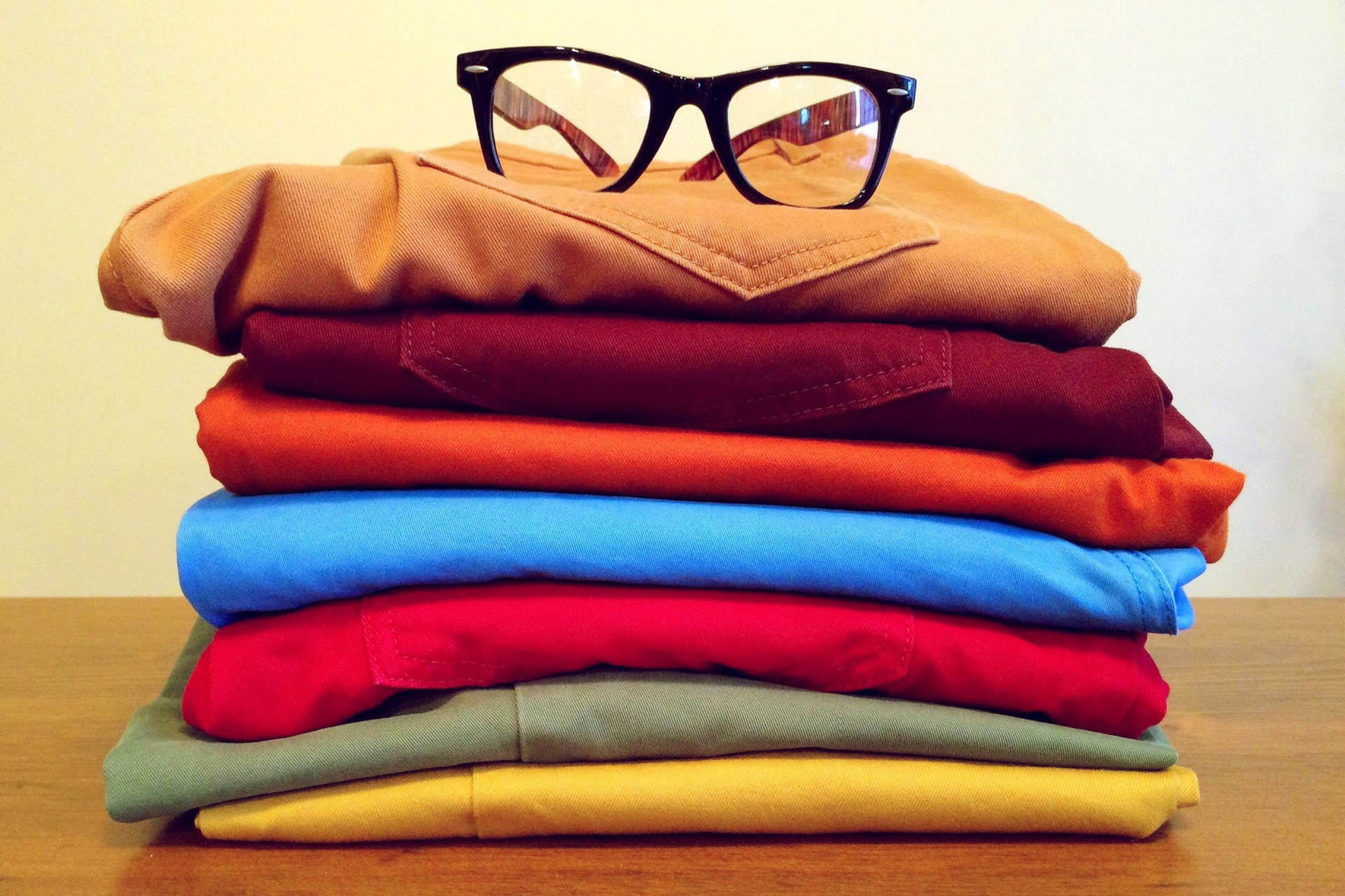 Folded Stack Of Clothes Wallpaper