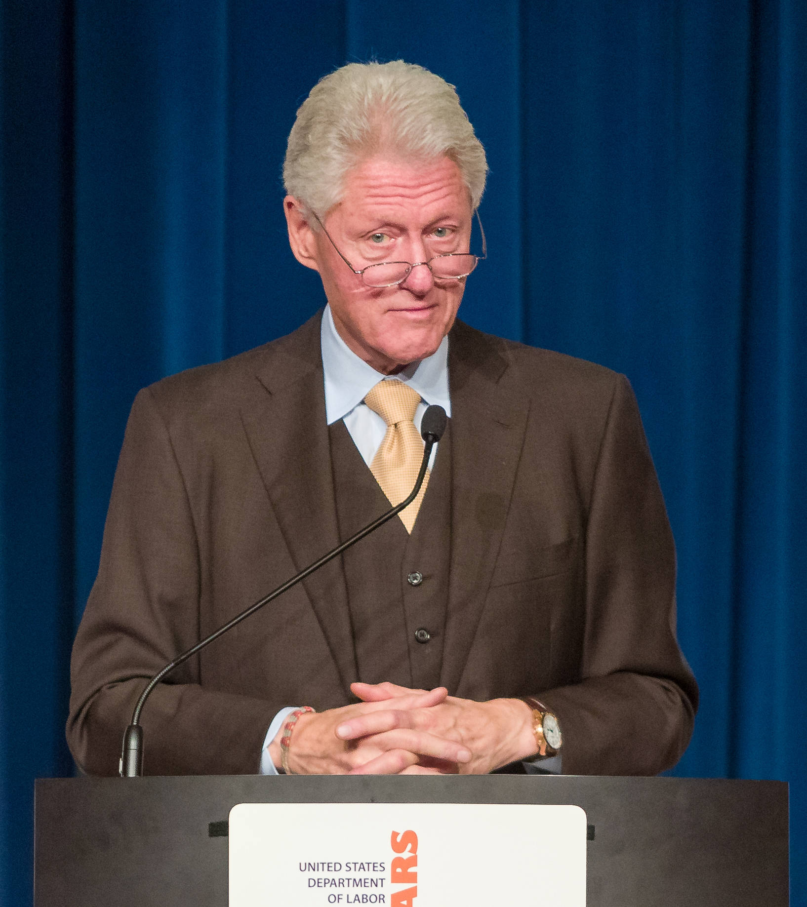 Former President Bill Clinton Delivering A Speech Wallpaper