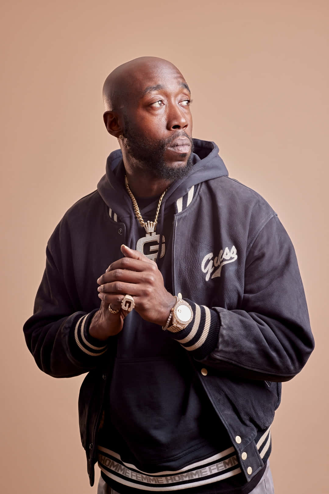 Freddie Gibbs Contemplative Pose Wallpaper