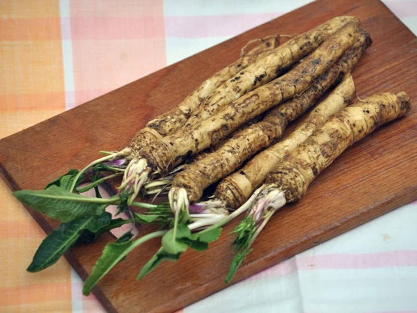 Fresh Horseradish On Chopping Board Wallpaper