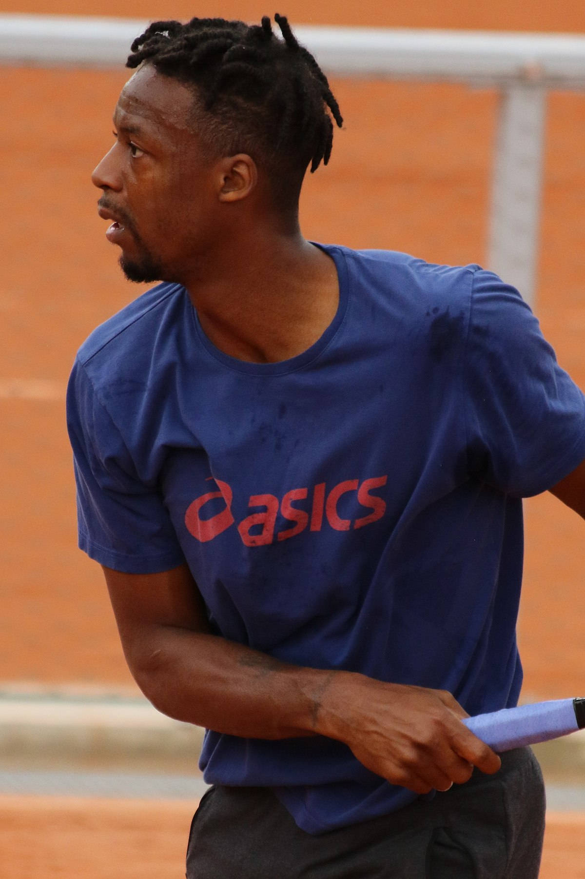 Gael Monfils Wearing Blue Asics Shirt Wallpaper