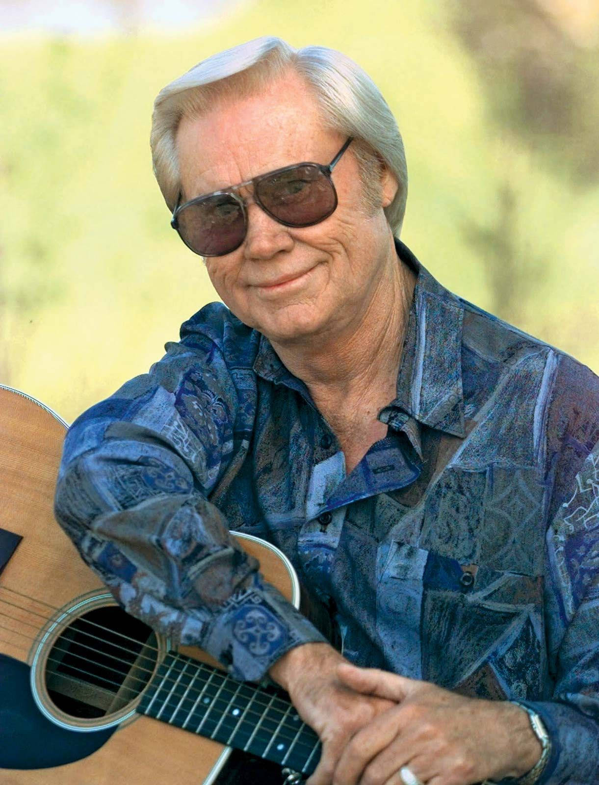 George Jones Holding Guitar Photography Wallpaper