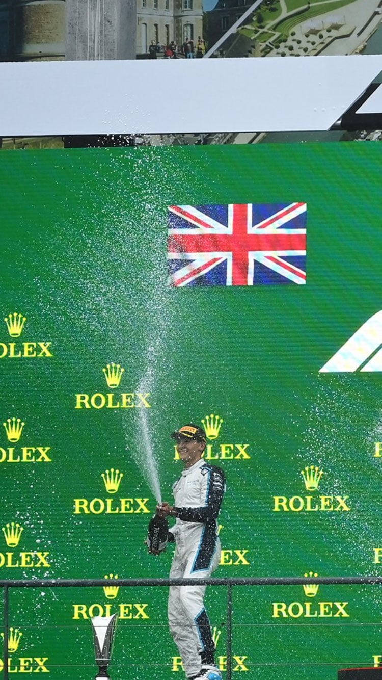 George Russel Popping A Bottle Wallpaper