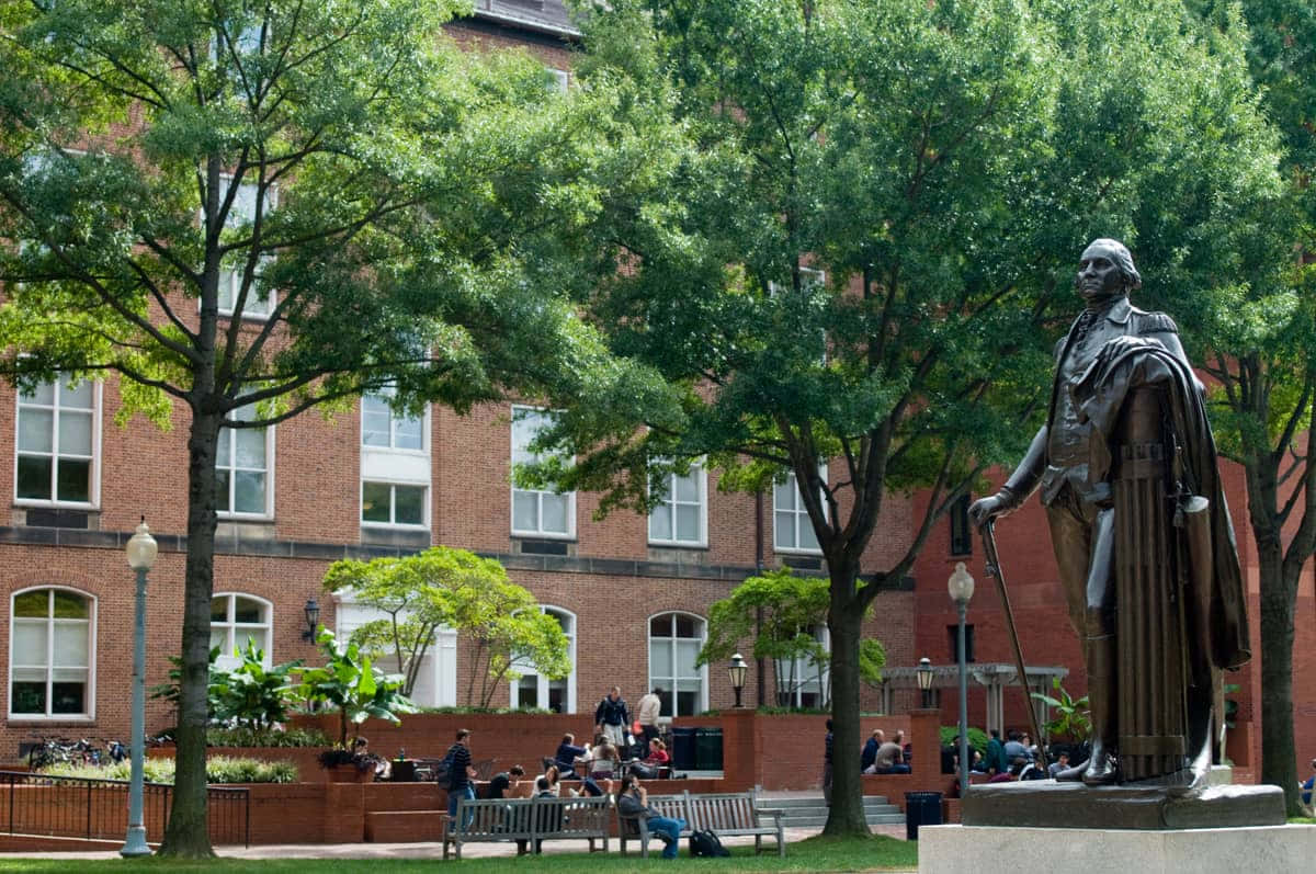 George Washington University Statue Surrounded By Trees Wallpaper