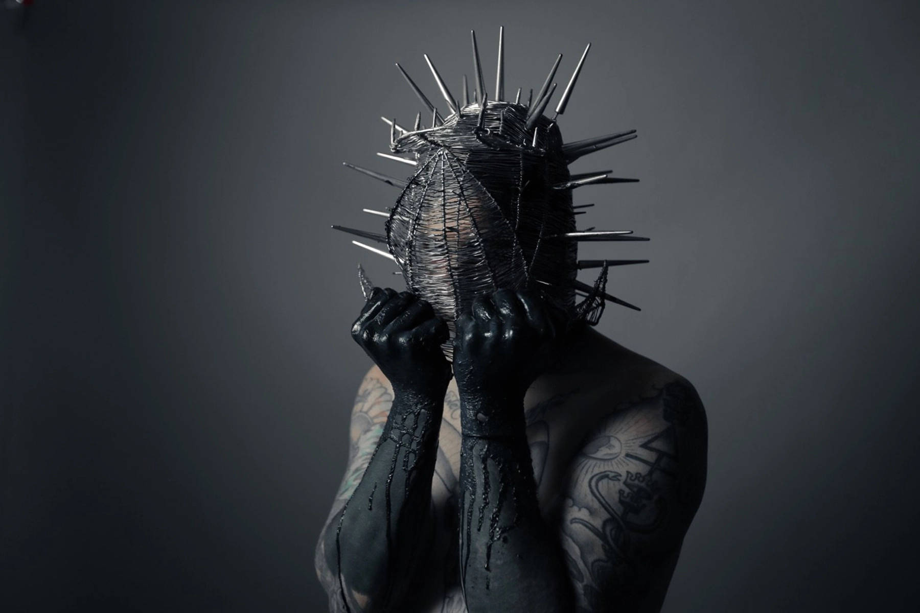 Ghostemane Black Hands And Spiky Helmet Wallpaper