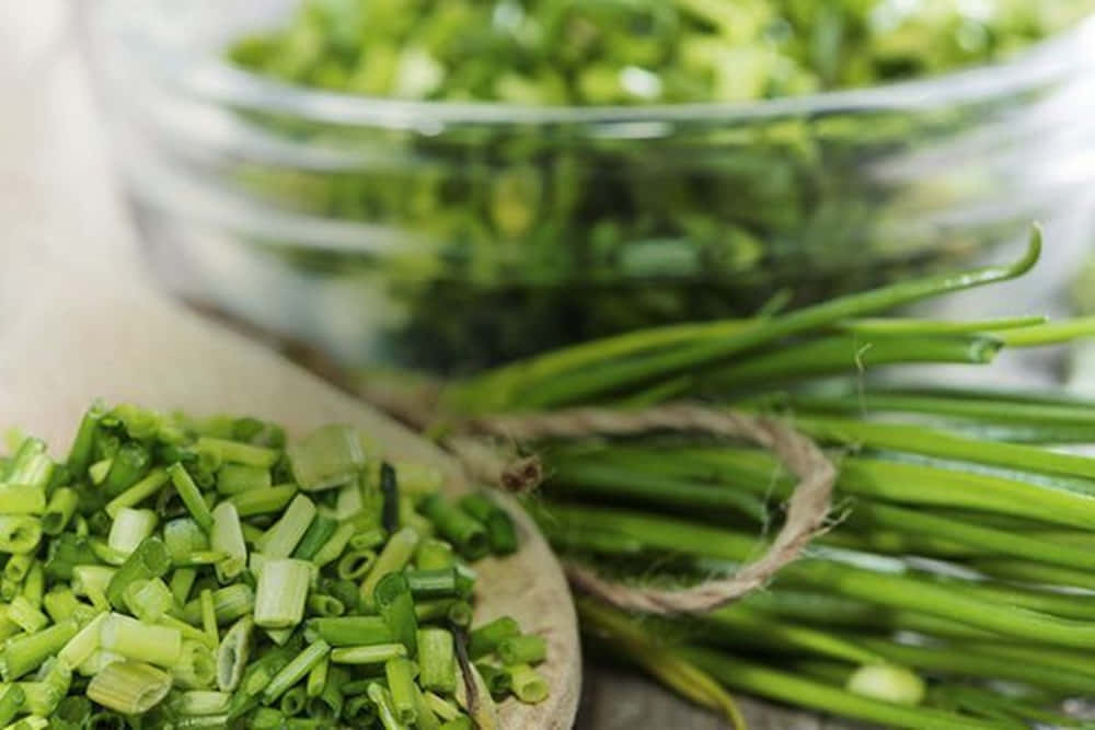 Glass Bowl Of Chopped Chives Wallpaper