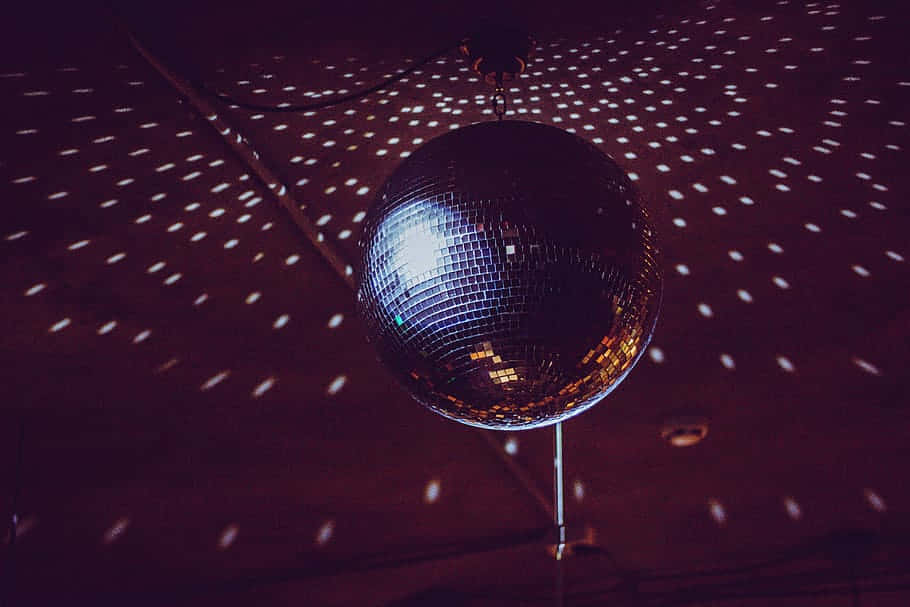 Glimmering Disco Ball Nightlife Wallpaper