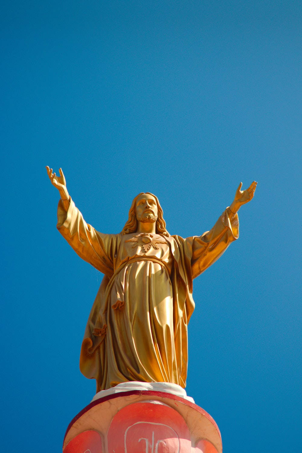 Golden Statue Jesus Phone Wallpaper