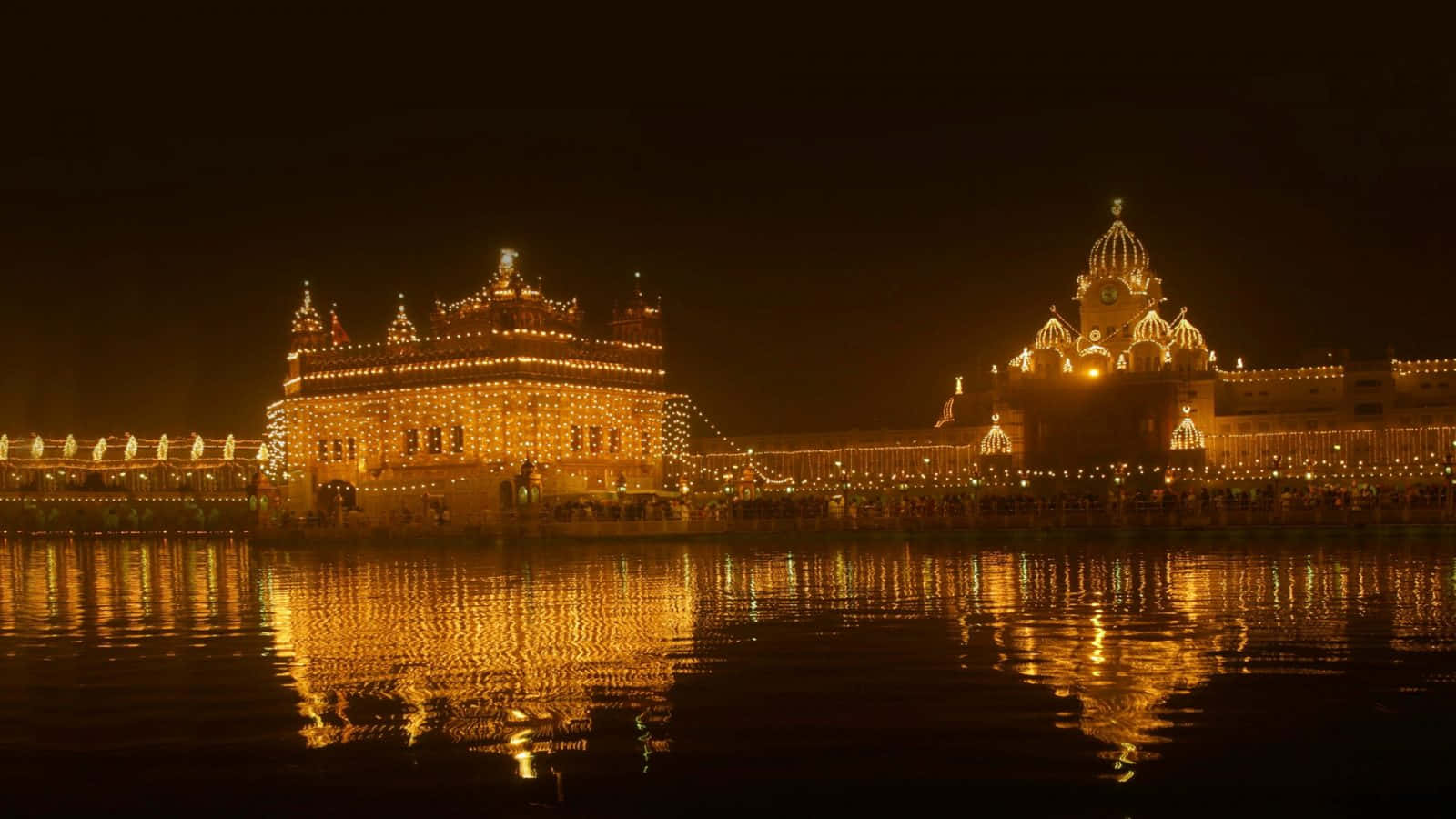 Golden Temple On Foggy Night Wallpaper