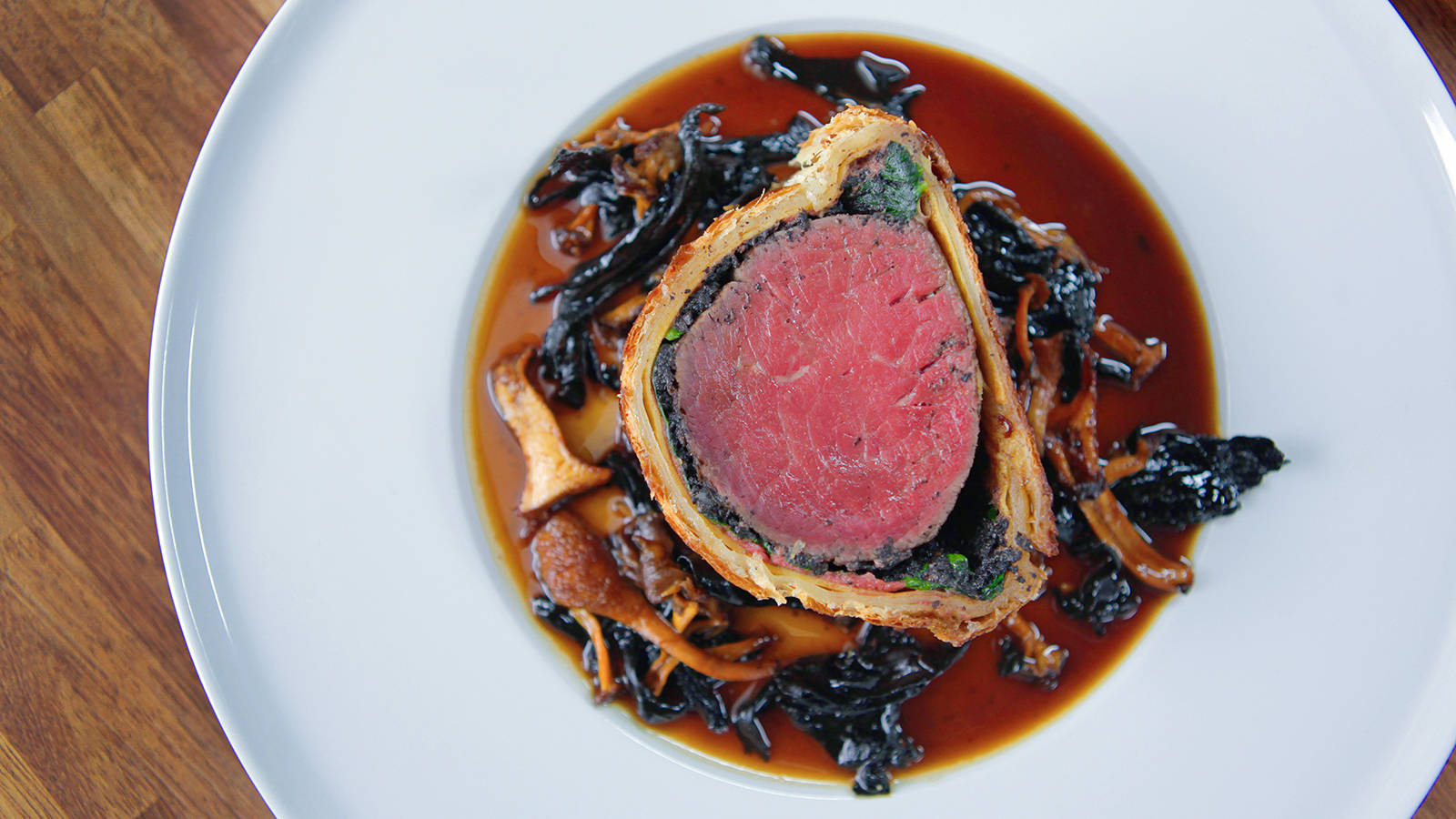 Gourmet Beef Wellington Topped With Wild Mushrooms Wallpaper