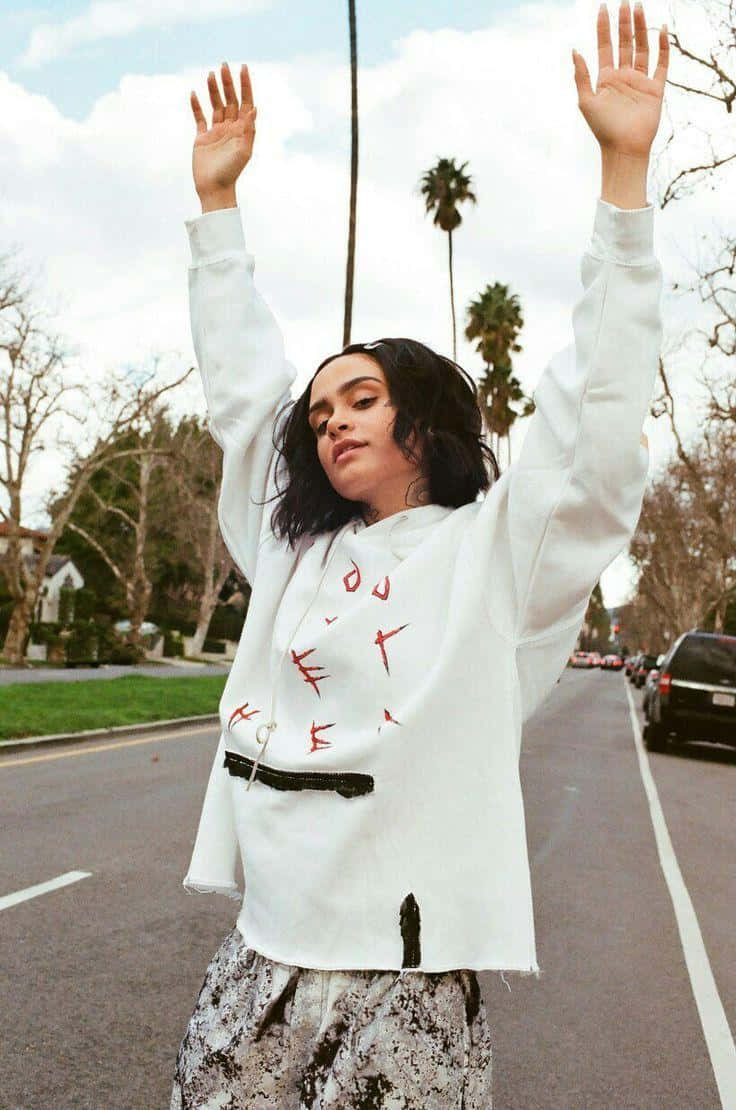 Grammy-nominated Artist Kehlani: Capturing The Artistry And Authenticity In A Candid Shot Wallpaper