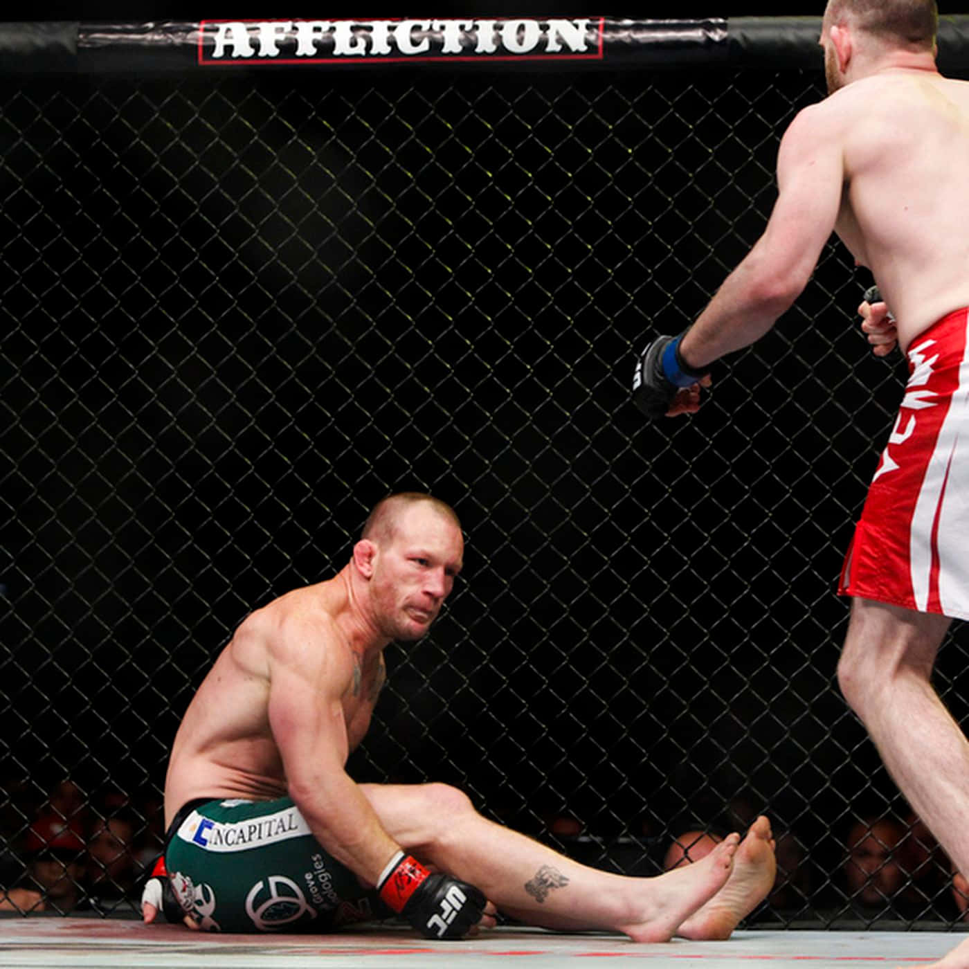 Gray Maynard Embracing The Fight In Ufc Wallpaper