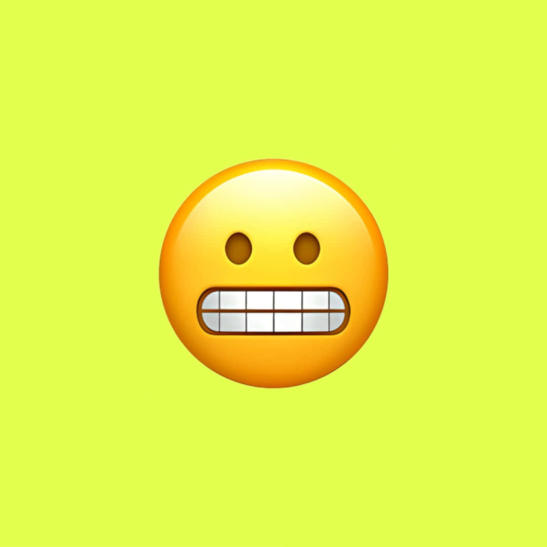 Grimacing Emoji Yellow Background Wallpaper