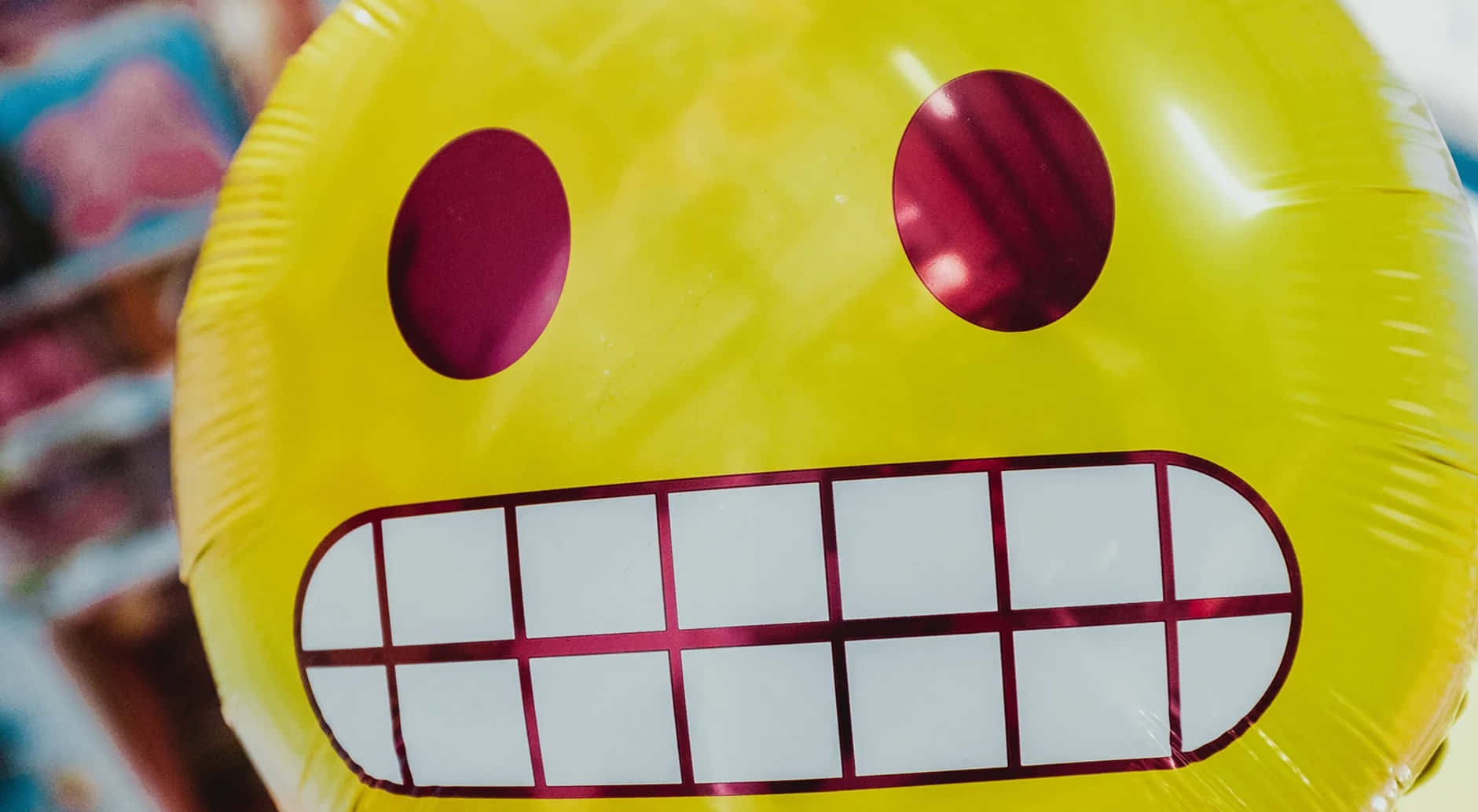 Grinning_ Emoji_ Balloon_ Closeup.jpg Wallpaper