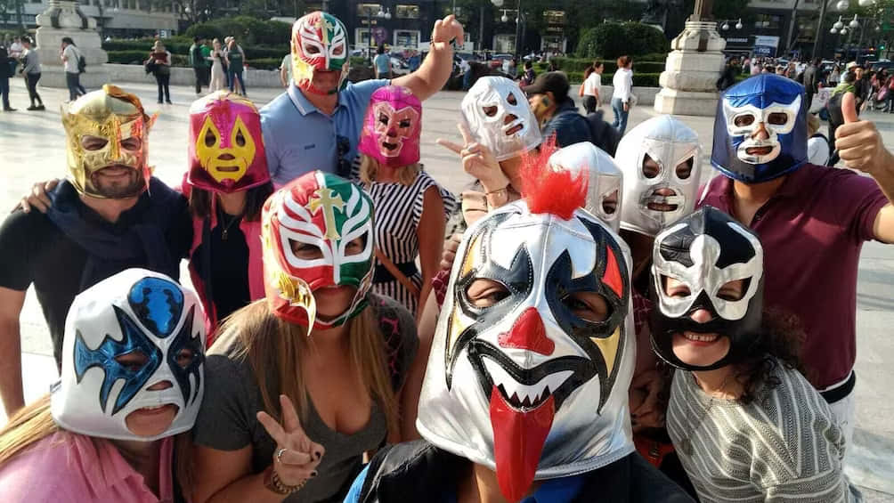 Groupof Friends Wearing Lucha Libre Masks Wallpaper