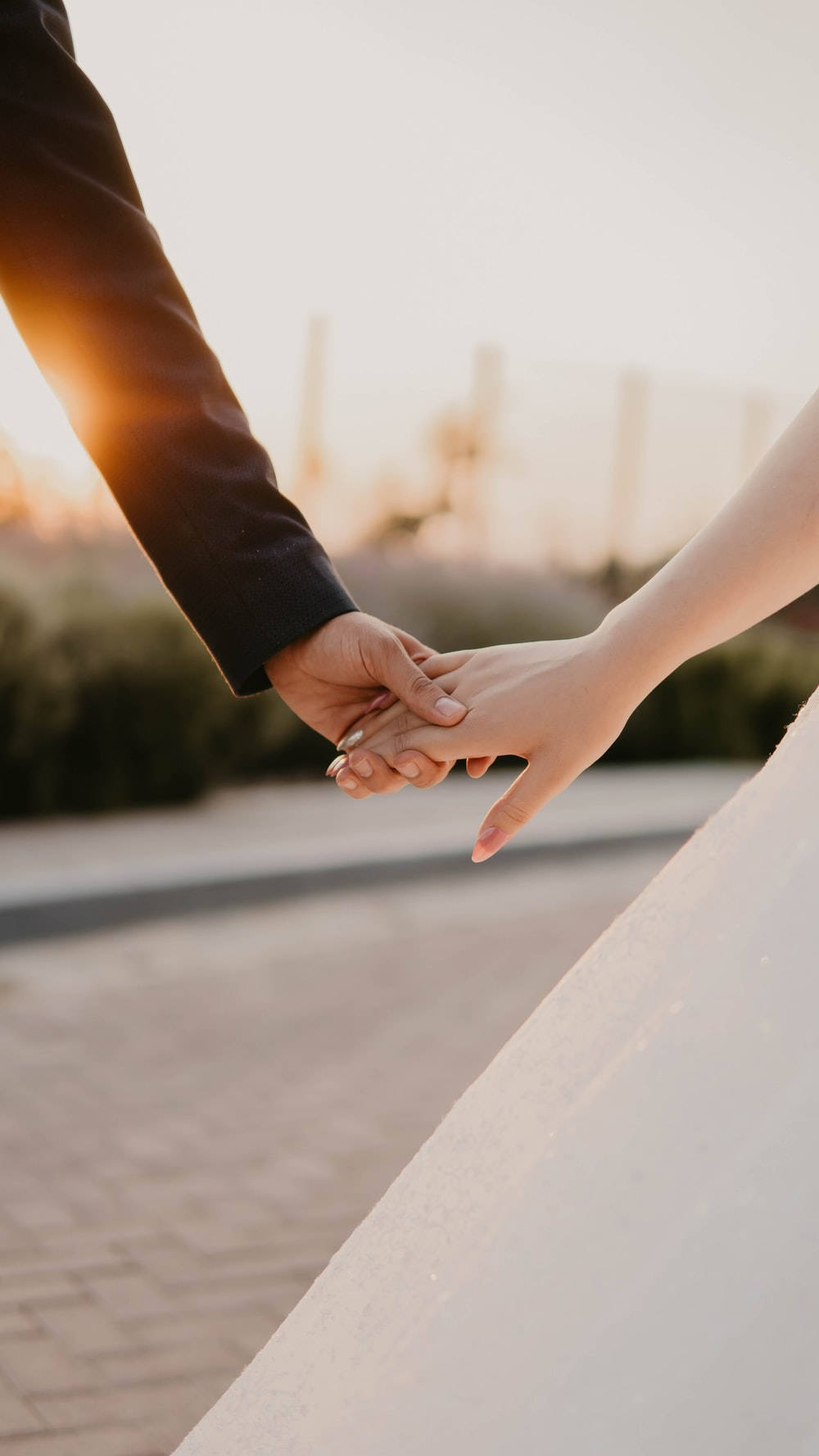 Hand In Hand Bride And Groom Wallpaper