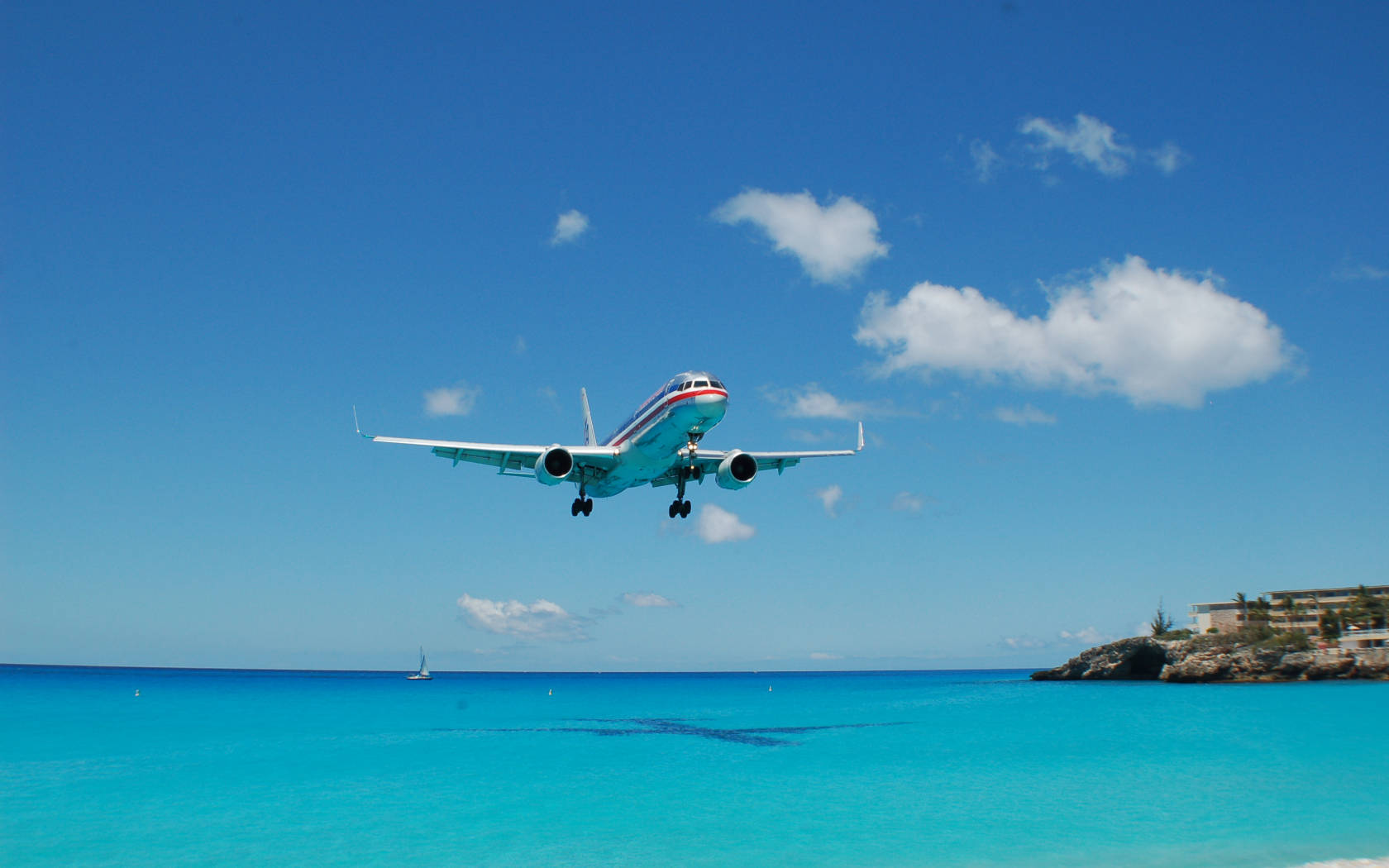 Hd Plane Flying Over Beach Wallpaper