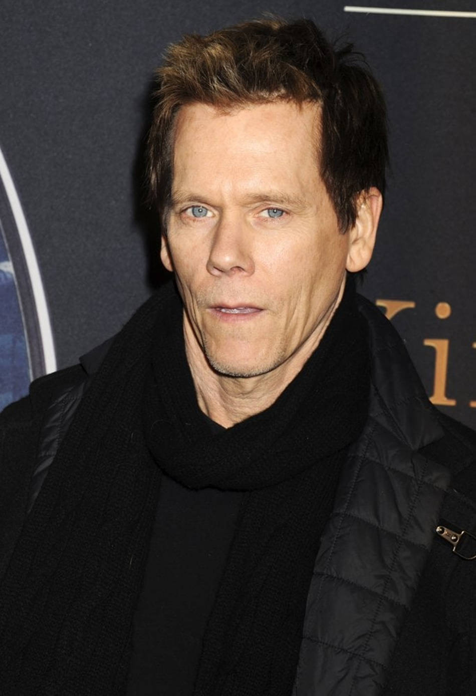 Hollywood Actor Kevin Bacon Posing In A Stylish Black Jacket Wallpaper