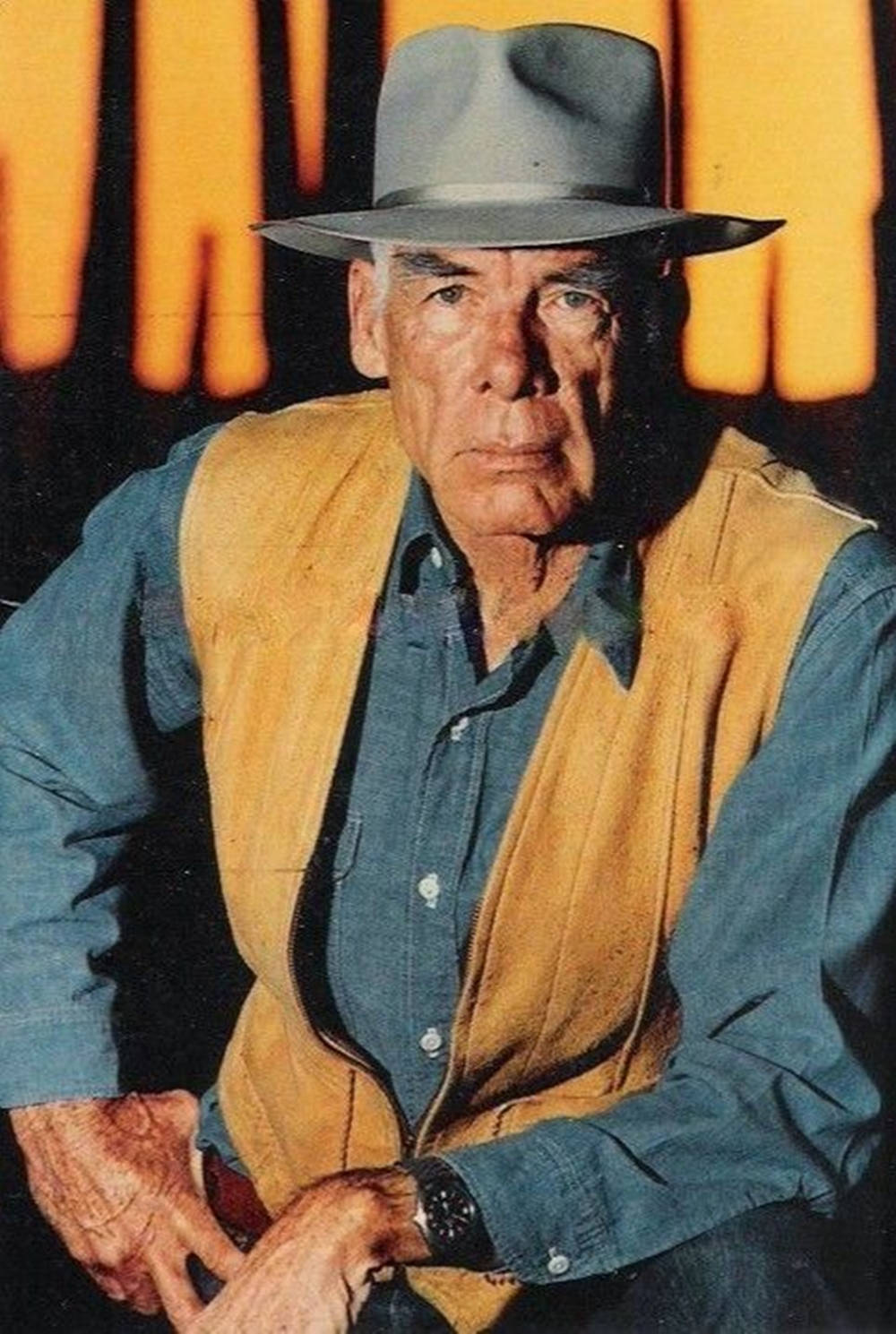 Iconic Hollywood Actor Lee Marvin In Brown Vest Wallpaper