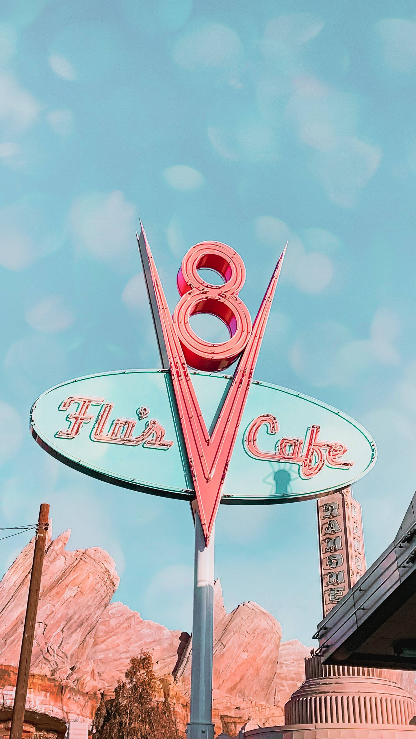 Illuminated Flo's V8 Cafe Sign At Disneyland Wallpaper