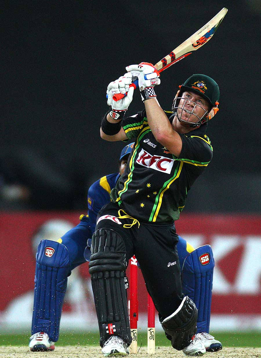 Intense David Warner In Black Cricket Uniform Wallpaper