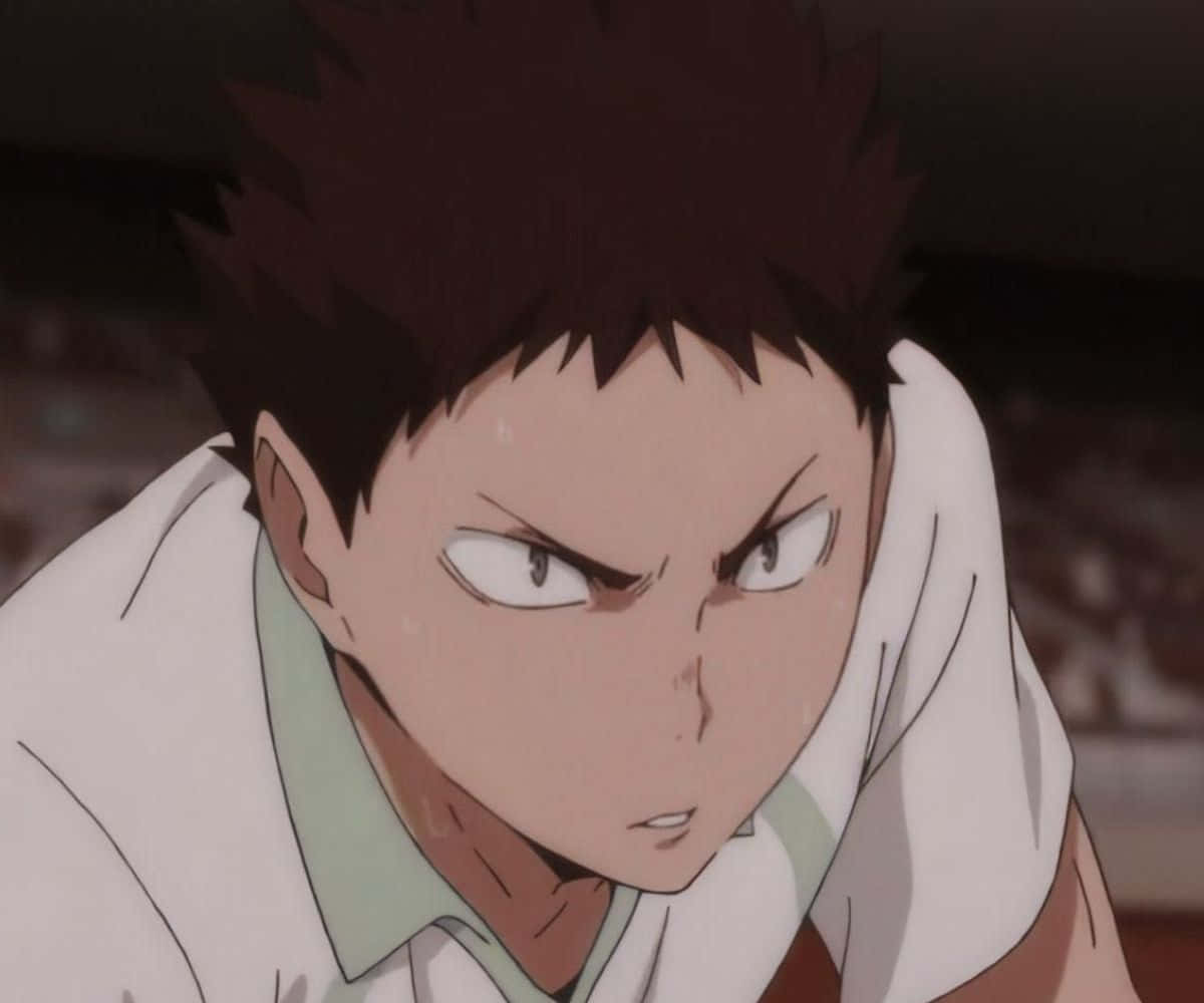 Iwaizumi Hajime Posing Confidently In His Karasuno High School Volleyball Uniform Wallpaper