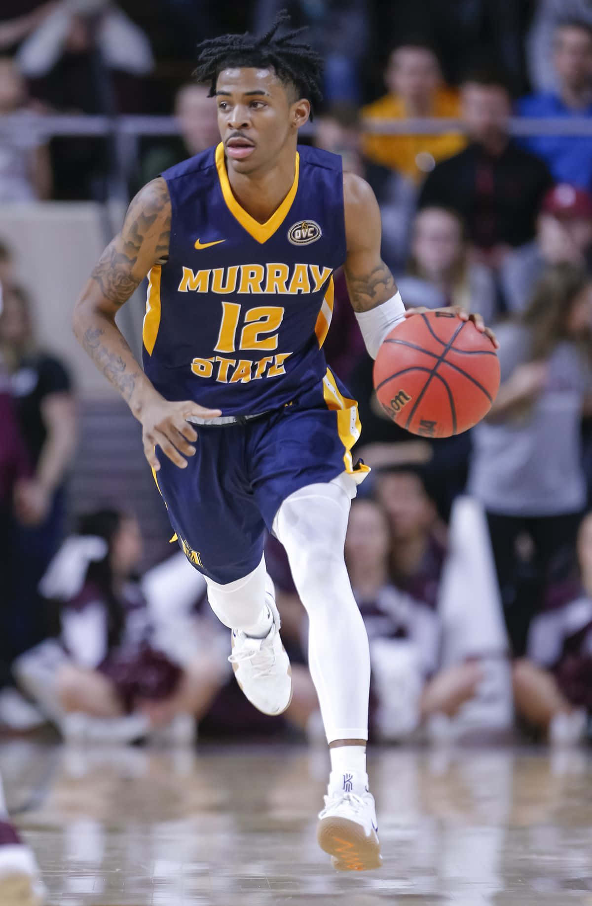 Ja Morrant Dribbling And Running Wallpaper