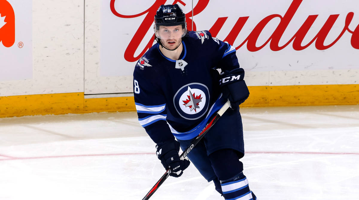 Jacob Trouba Fully Engaged On The Ice Wallpaper