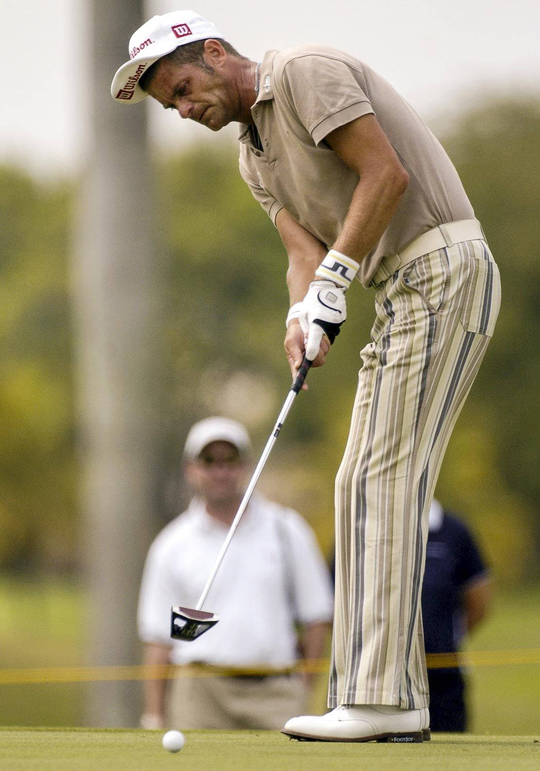 Jesper Parnevik In Brown Golf Attire Wallpaper