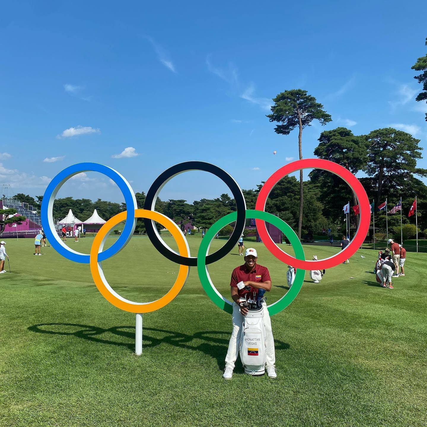 Jhonattan Vegas And Olympics Logo Wallpaper