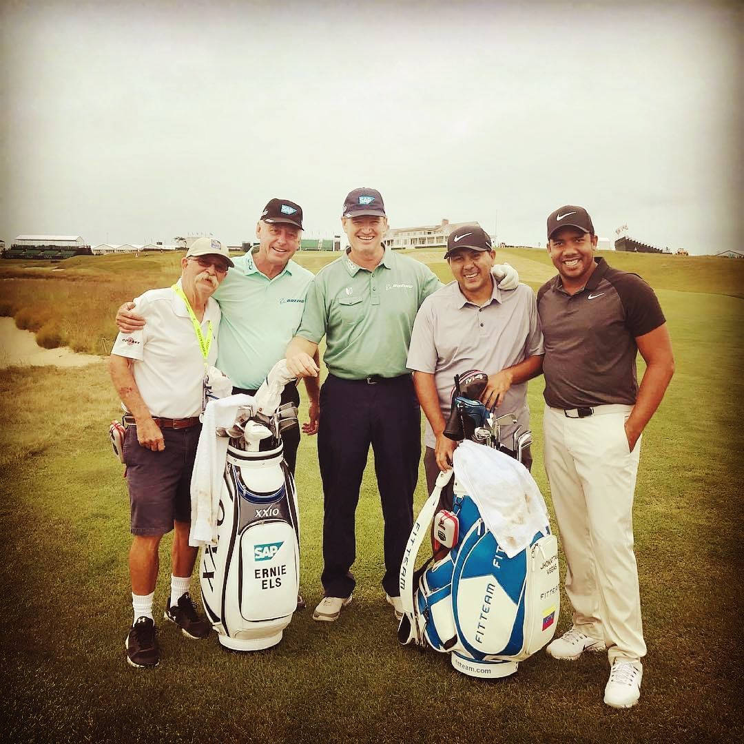 Jhonattan Vegas With Golfers And Caddie Wallpaper