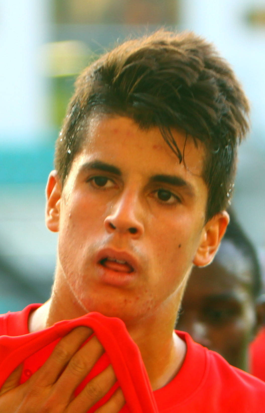 Joao Cancelo Wipes Face Wallpaper