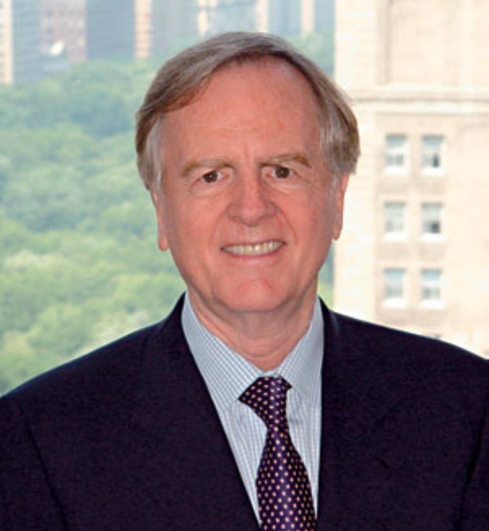 John Sculley Smiling On Camera Wallpaper