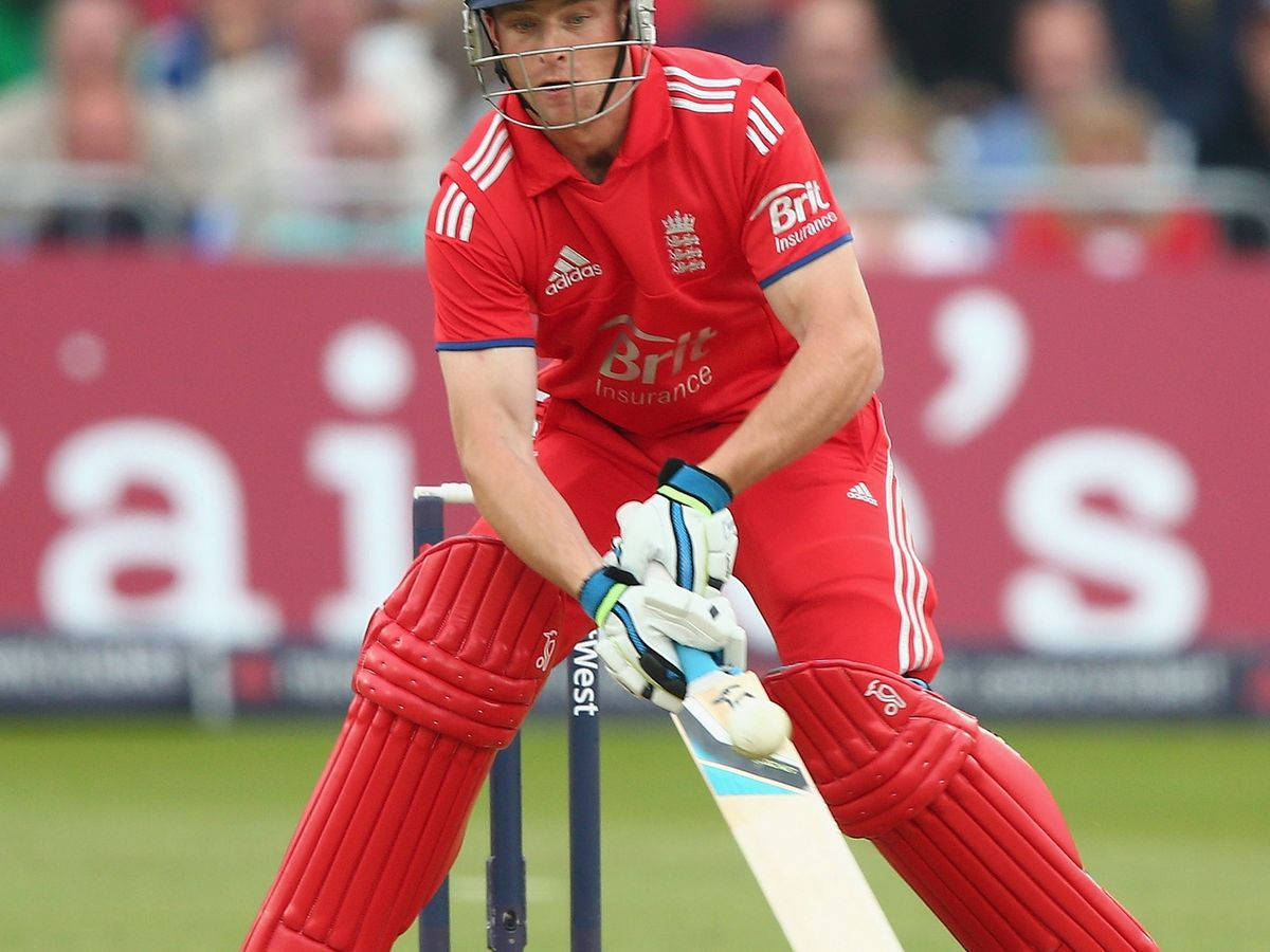 Jos Buttler In Red Cricket Gear Wallpaper