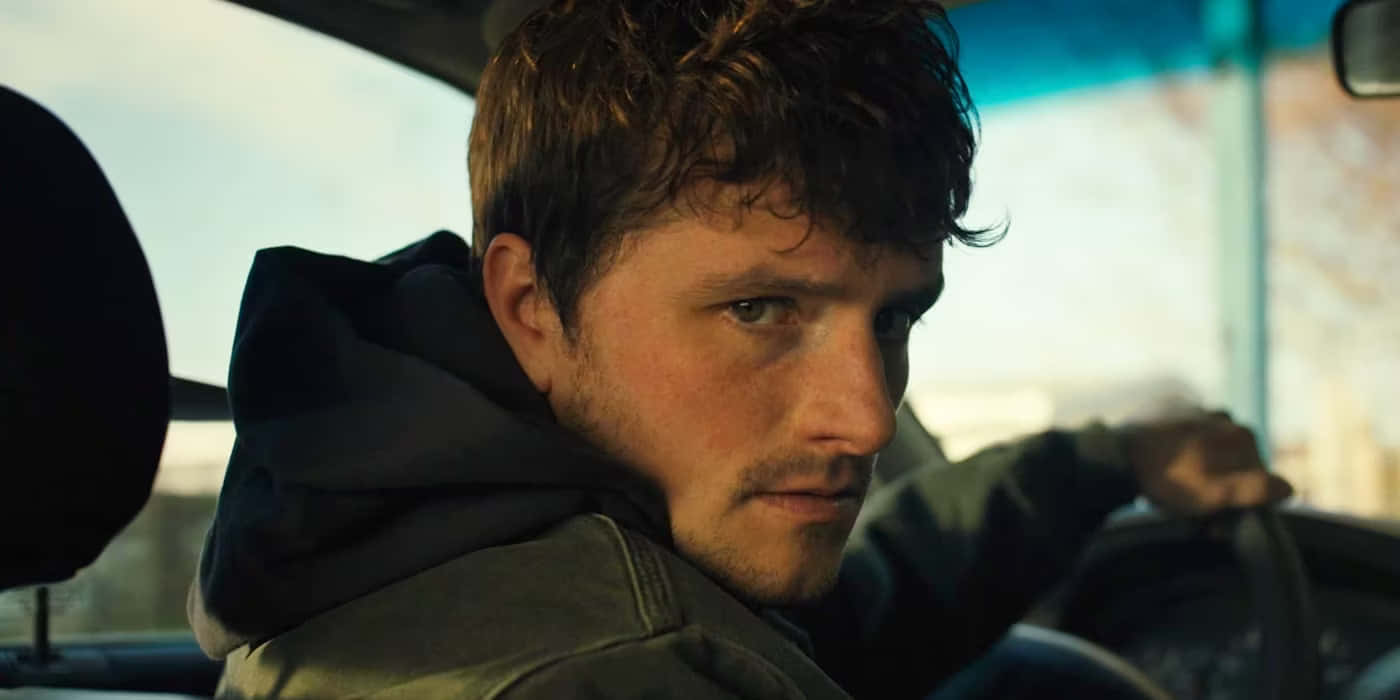 Josh Hutcherson Intense Car Scene Wallpaper