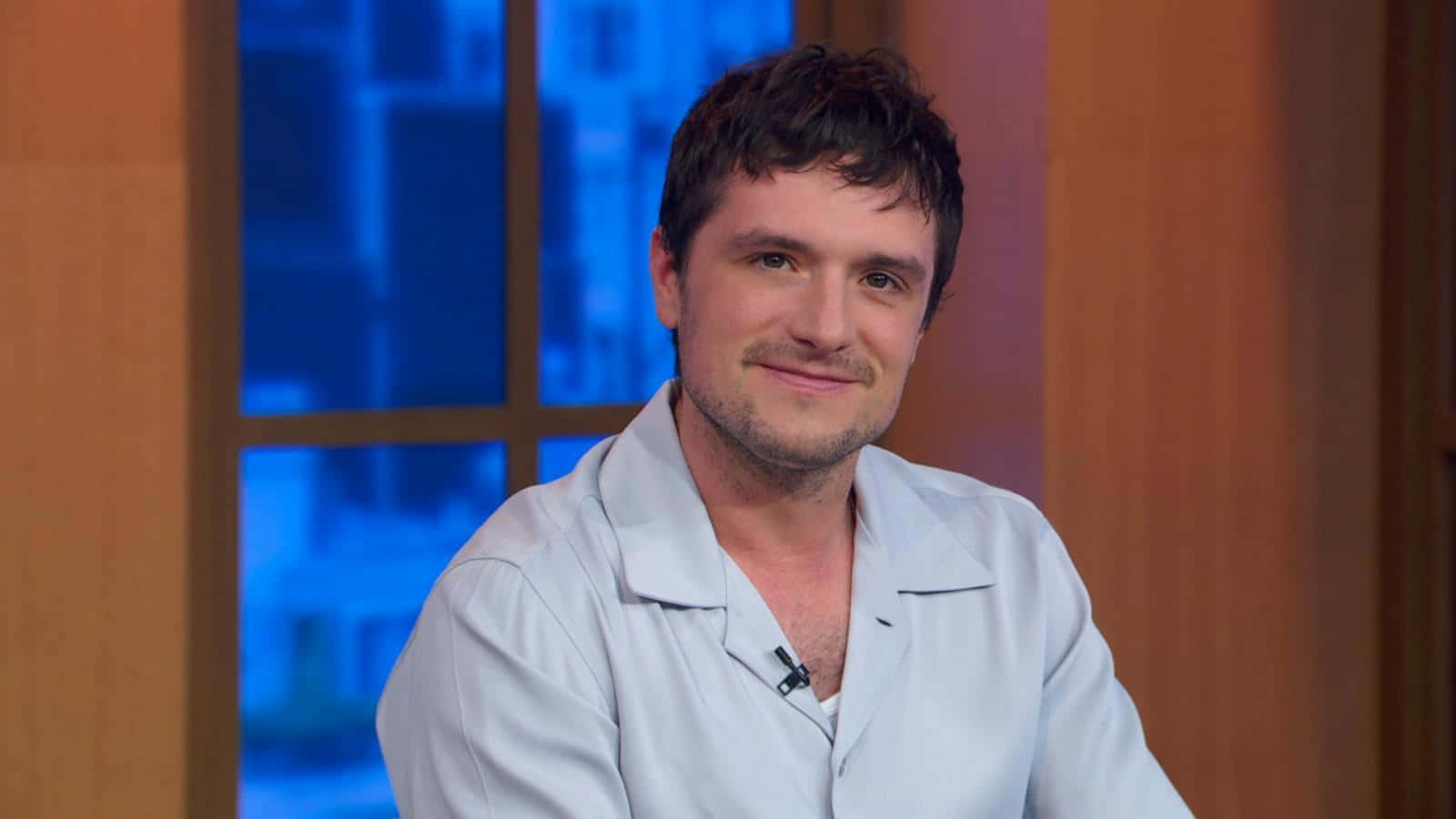 Josh Hutcherson Smiling During Interview Wallpaper