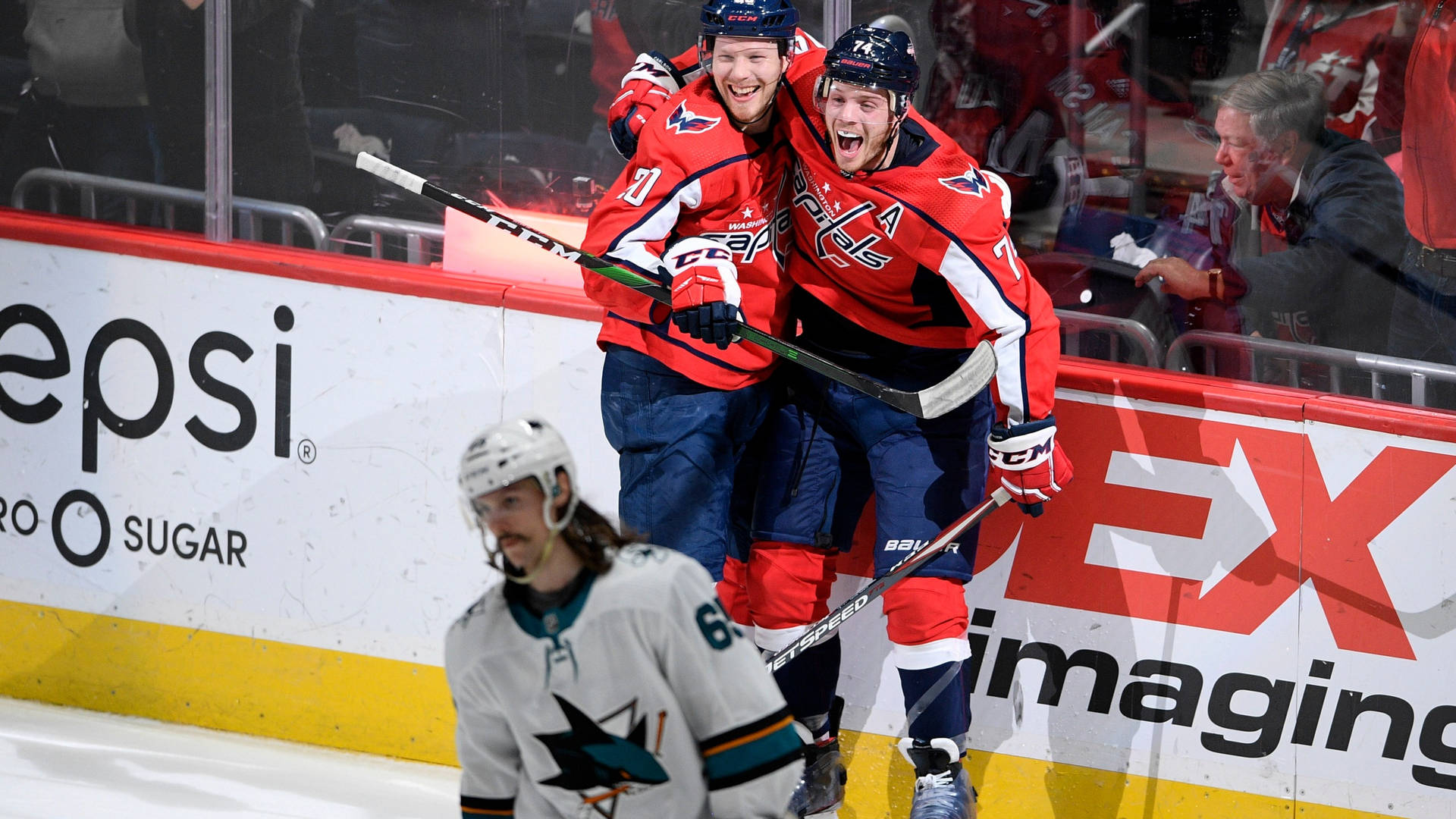 Joyful Washington Capitals John Carlson With Teammate Wallpaper