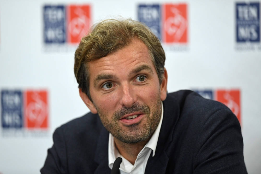 Julien Benneteau Addressing A Press Conference Wallpaper