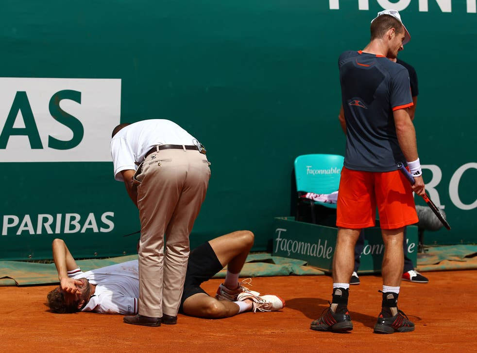 Julien Benneteau In Agony With Fractured Elbow Wallpaper