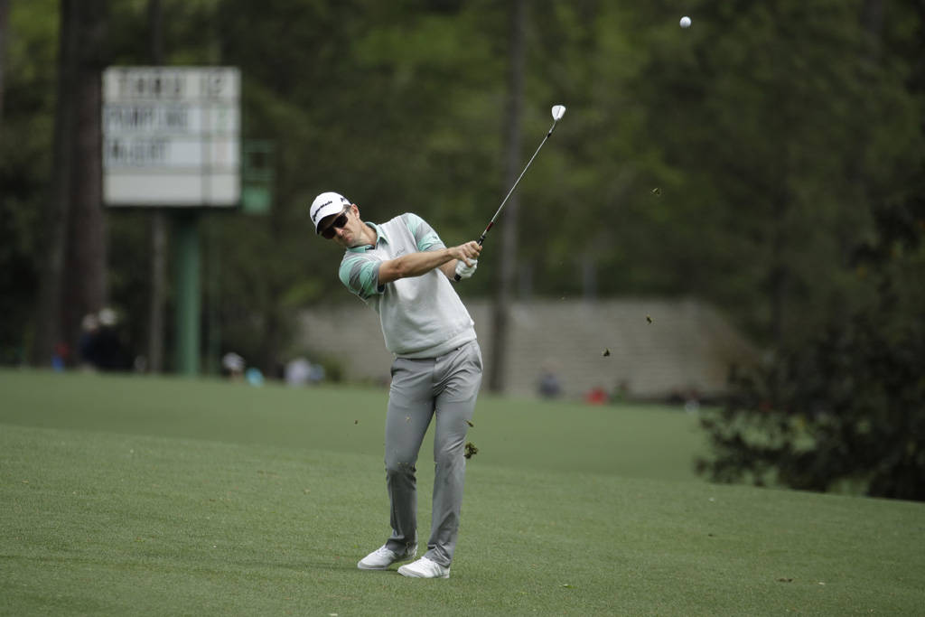 Justin Rose Swinging A Golf Club Wallpaper