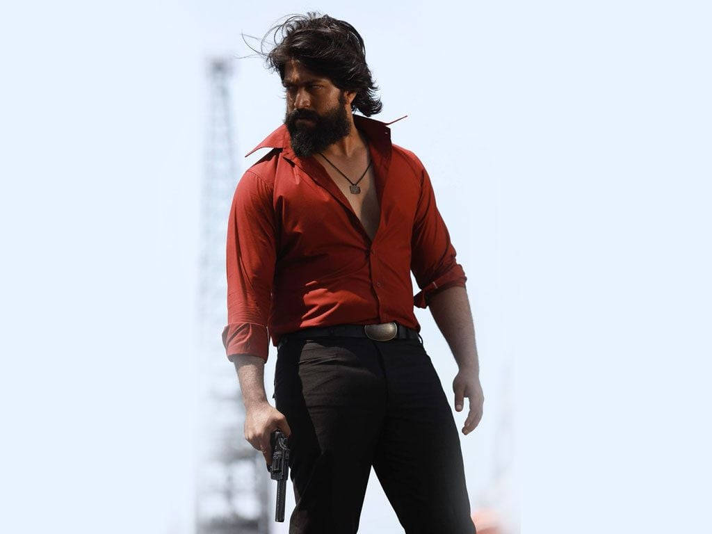 Kgf Yash With Gun Wallpaper