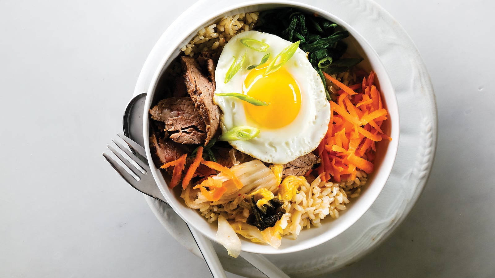 Korean Bibimbap With White Dishes Wallpaper