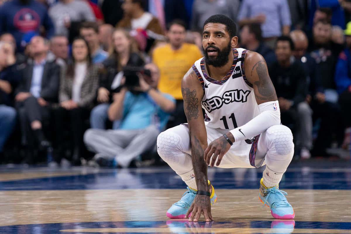 Kyrie Irving Of The Brooklyn Nets Poses For A Photoshoot Wallpaper