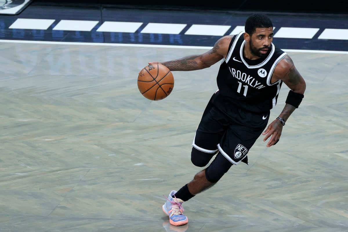 Kyrie Irving Shines Brightly In Debut Performance With Brooklyn Nets Wallpaper