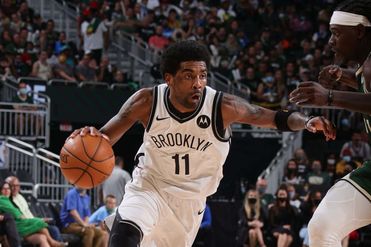 Kyrie Irving Shines In Brooklyn Nets Debut Wallpaper