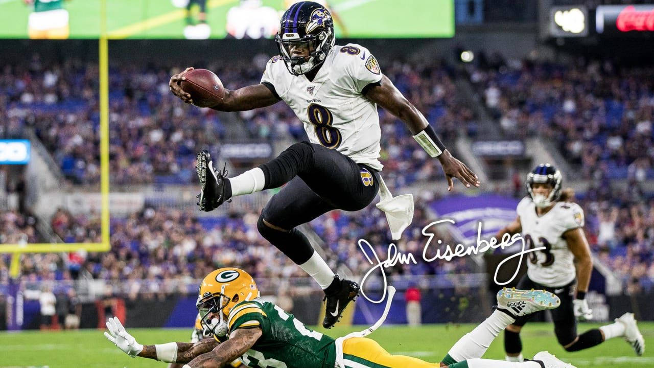 Lamar Jackson Mid Air Jump Wallpaper