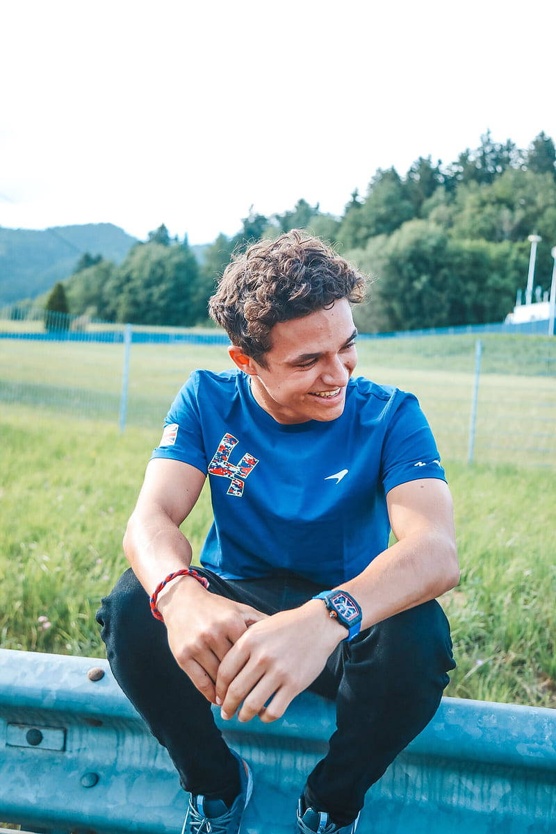 Lando Norris Candid Smiling Wallpaper