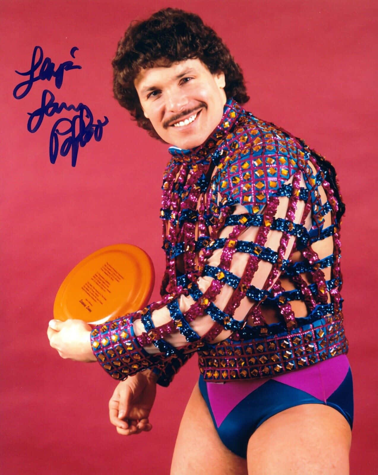 Lanny Poffo Smiling In A Sweater Wallpaper